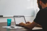 Man looking at facebook ads dashboard